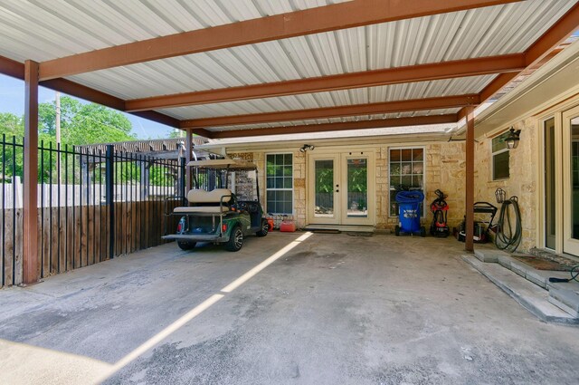 view of car parking with french doors