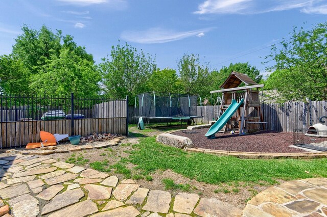 view of playground with a trampoline