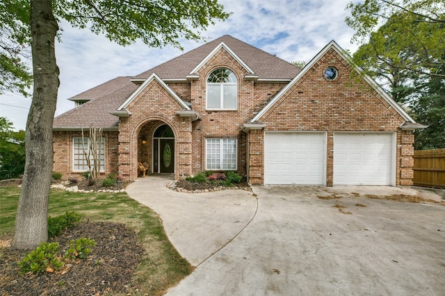 view of front of property with a garage