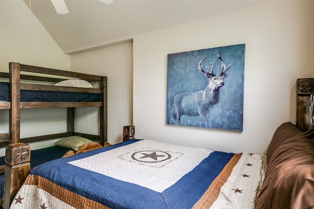 bedroom with ceiling fan and vaulted ceiling