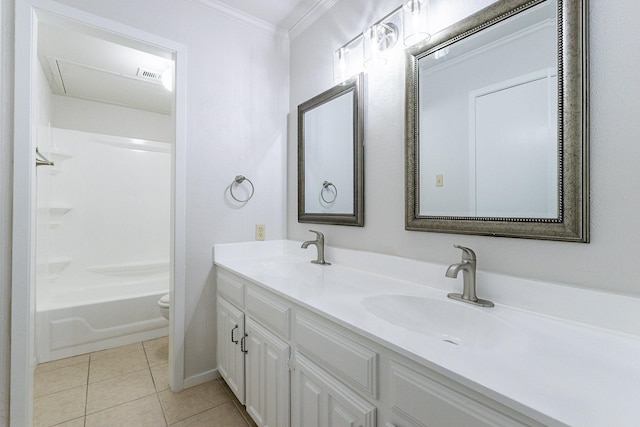 full bathroom with tile patterned flooring, bathing tub / shower combination, toilet, vanity, and ornamental molding