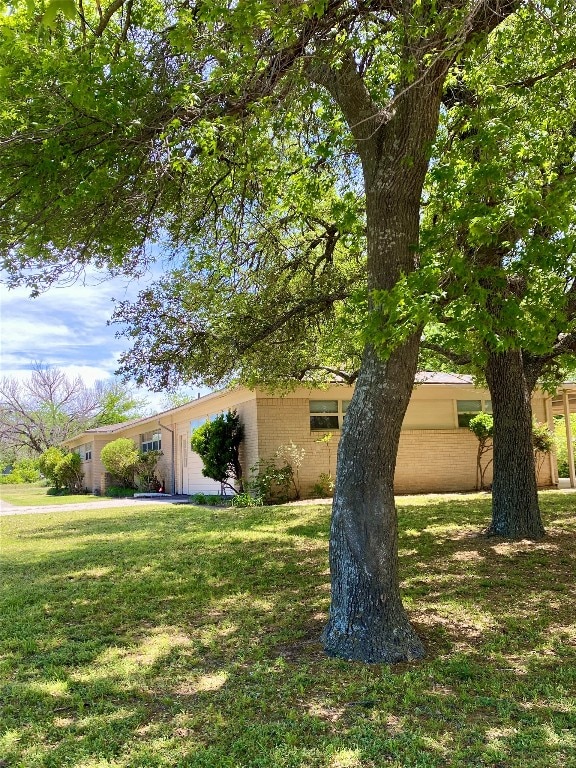 view of front of home with a front yard