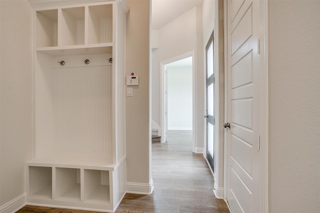 mudroom with hardwood / wood-style flooring