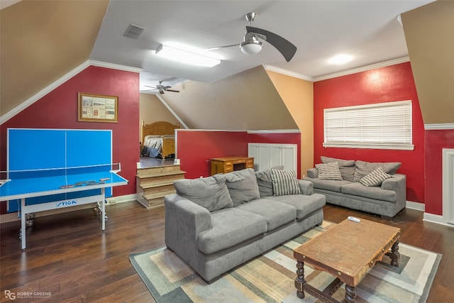 living room with ceiling fan, ornamental molding, and dark wood-type flooring