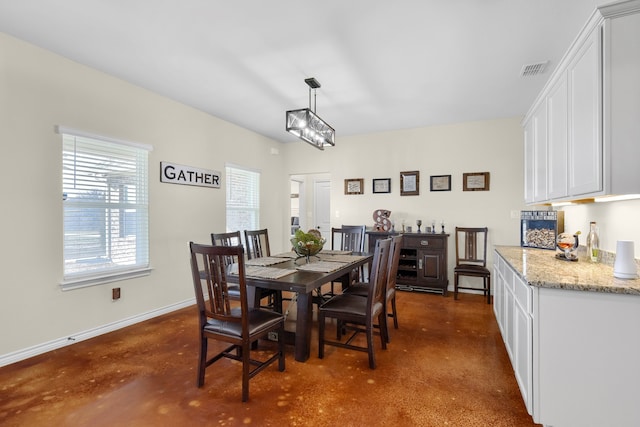 dining room featuring an inviting chandelier