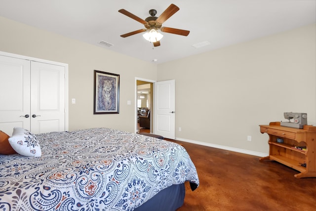 bedroom with dark carpet, ceiling fan, and a closet