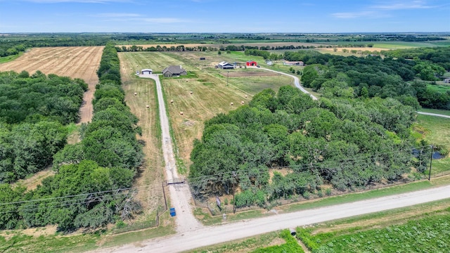 birds eye view of property featuring a rural view