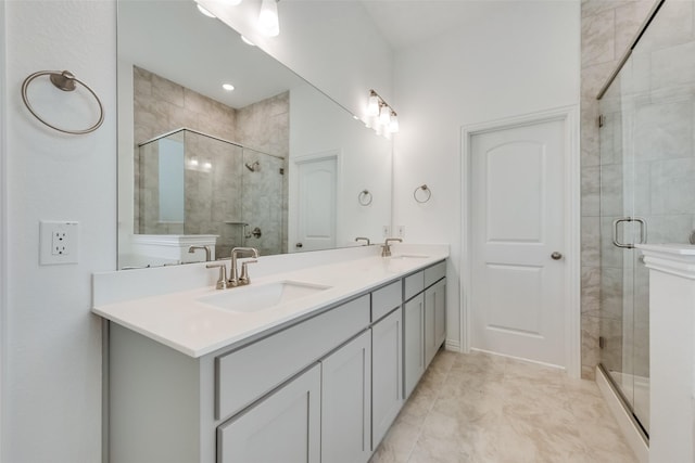 bathroom with vanity and walk in shower