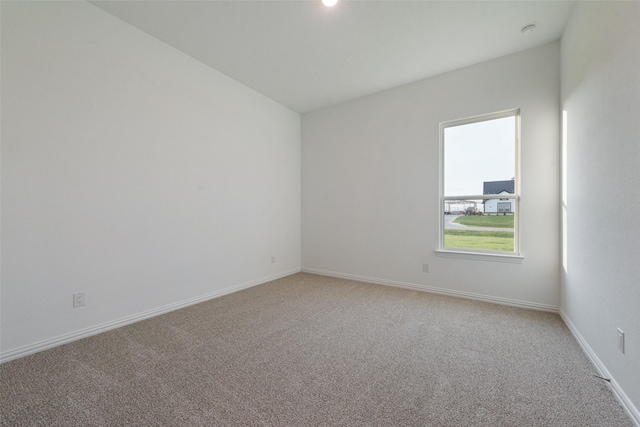 empty room featuring carpet floors