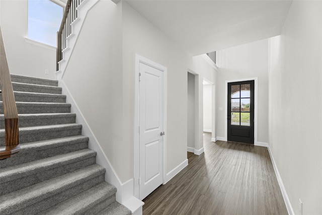 foyer featuring dark hardwood / wood-style floors