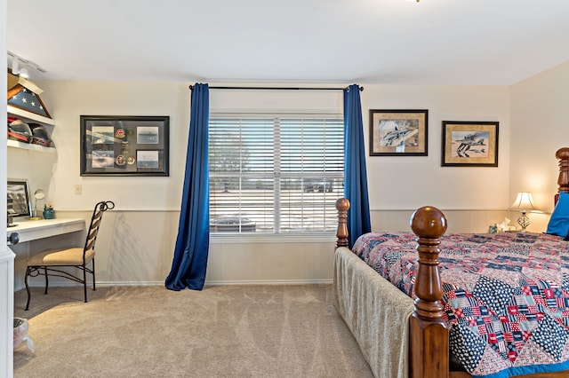 bedroom with light colored carpet