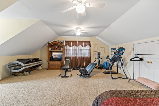 exercise area with carpet floors, lofted ceiling, and ceiling fan