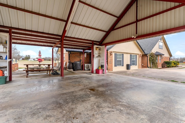 garage featuring a carport