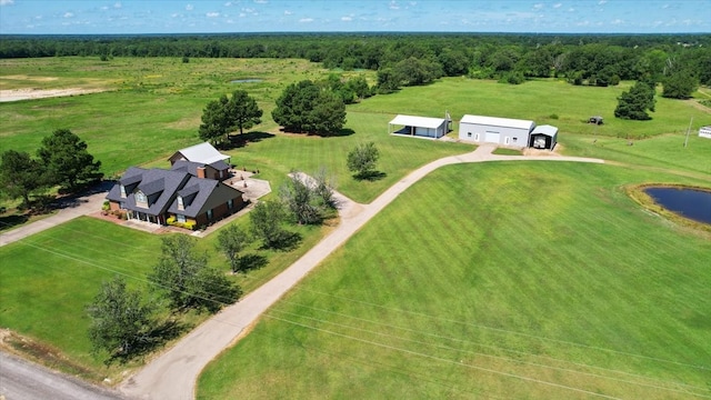 birds eye view of property with a rural view