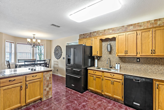 kitchen with a chandelier, a textured ceiling, backsplash, black appliances, and sink