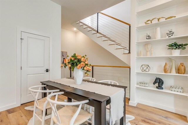 dining area featuring light wood-type flooring