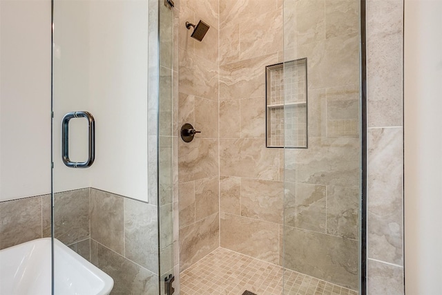 bathroom with independent shower and bath