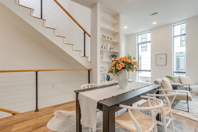 dining space with light wood-type flooring