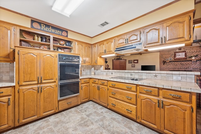 kitchen with visible vents, brown cabinets, under cabinet range hood, black appliances, and open shelves