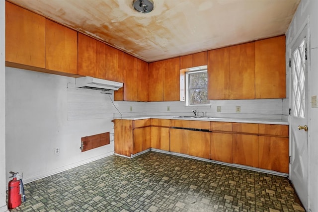 kitchen with decorative backsplash and sink