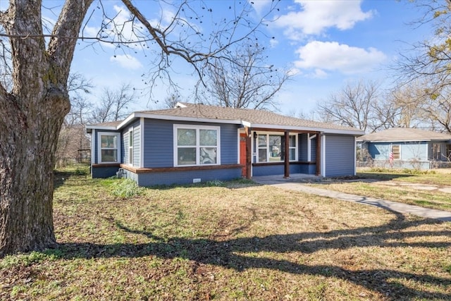 ranch-style house with a front lawn