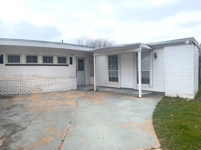 view of front of home with a patio area