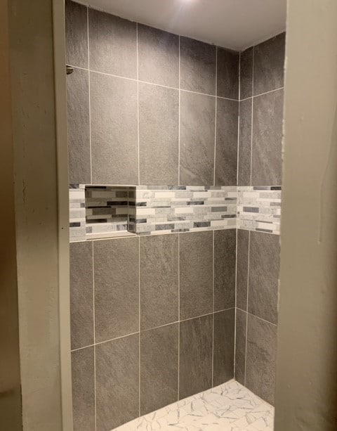 bathroom featuring a shower