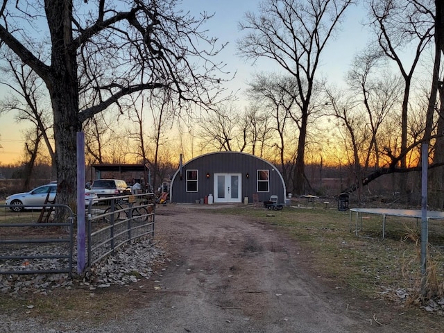 view of front of house with a trampoline