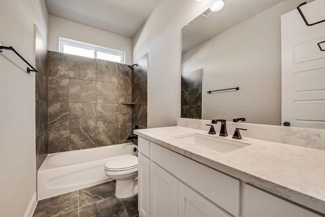 full bathroom with shower / washtub combination, vanity, and toilet