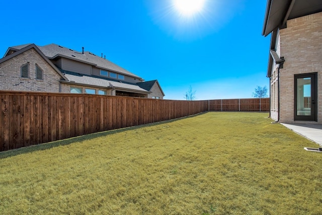 view of yard featuring a fenced backyard