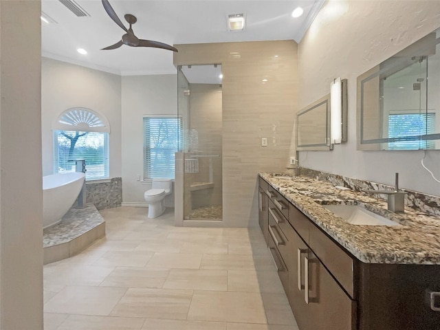 full bathroom featuring tile floors, ceiling fan, toilet, shower with separate bathtub, and ornamental molding