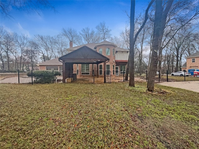 view of front of property with a front yard and a gazebo