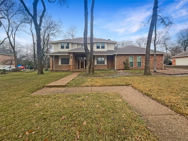 view of front of home with a front lawn