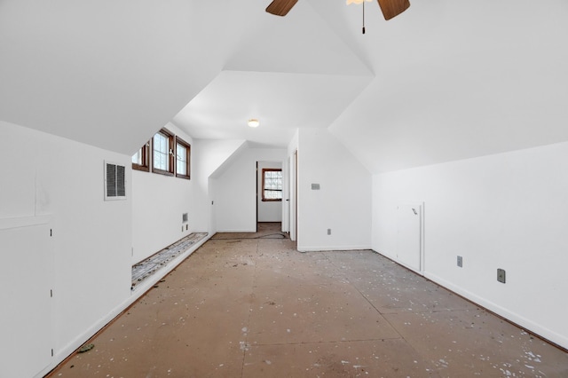 bonus room with lofted ceiling and ceiling fan