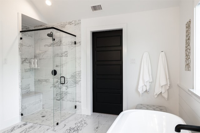 bathroom featuring separate shower and tub and tile flooring