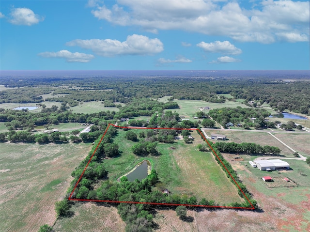 aerial view featuring a rural view and a water view