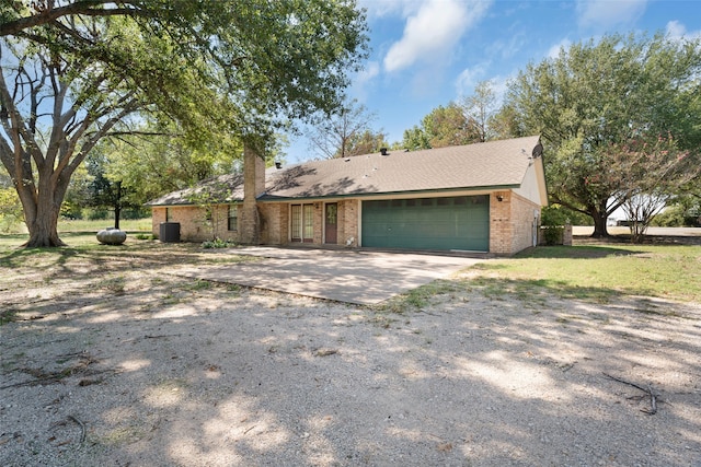 ranch-style home with a garage