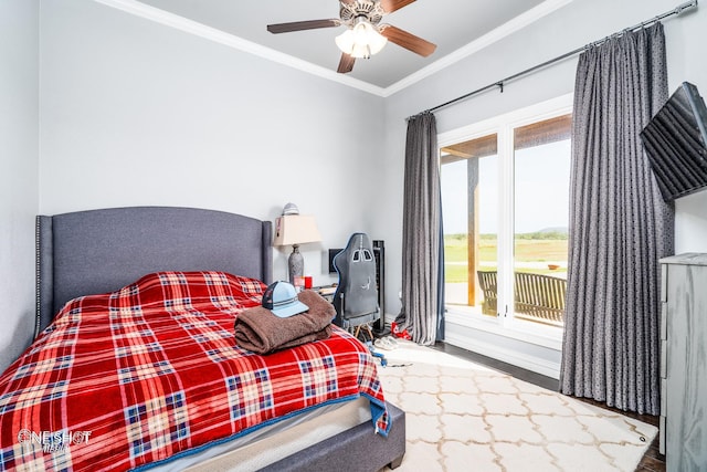 bedroom featuring ceiling fan, crown molding, and access to exterior