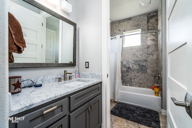 bathroom with shower / bath combo and vanity