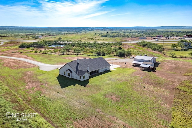 bird's eye view with a rural view