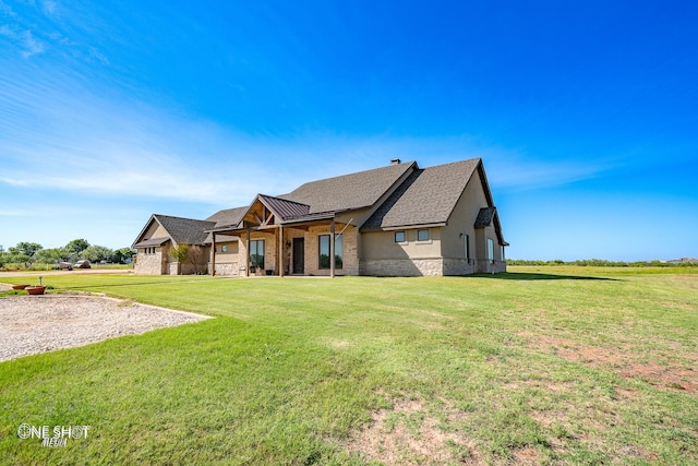 view of front of house with a front lawn