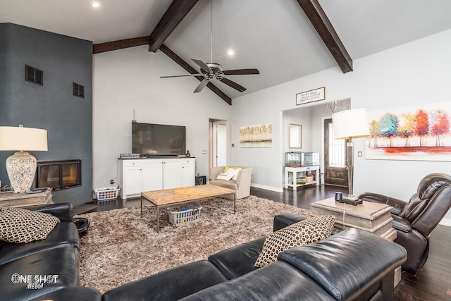 living room featuring beamed ceiling, ceiling fan, dark wood-type flooring, and high vaulted ceiling