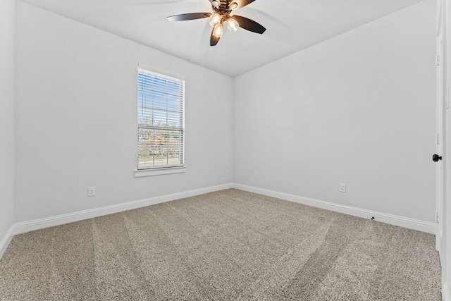 empty room with carpet and ceiling fan