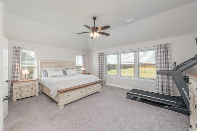 bedroom with light carpet, ceiling fan, and lofted ceiling