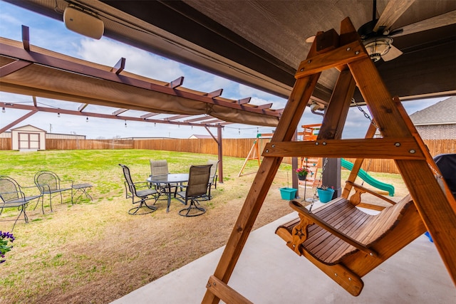 view of patio / terrace with a shed