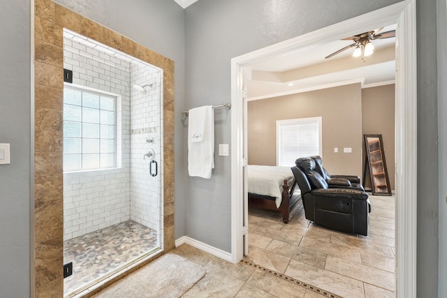 bathroom with ceiling fan, tile flooring, walk in shower, and crown molding