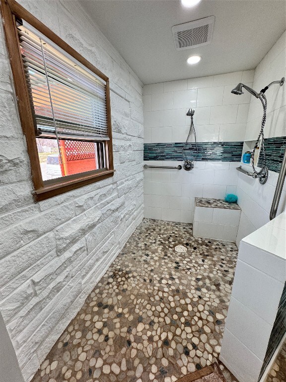 bathroom featuring walk in shower