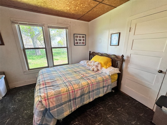 bedroom featuring multiple windows