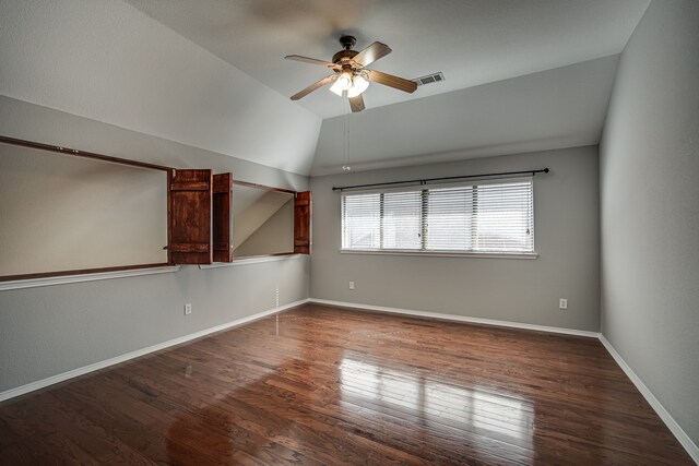 living room with light hardwood / wood-style floors, vaulted ceiling, and ceiling fan