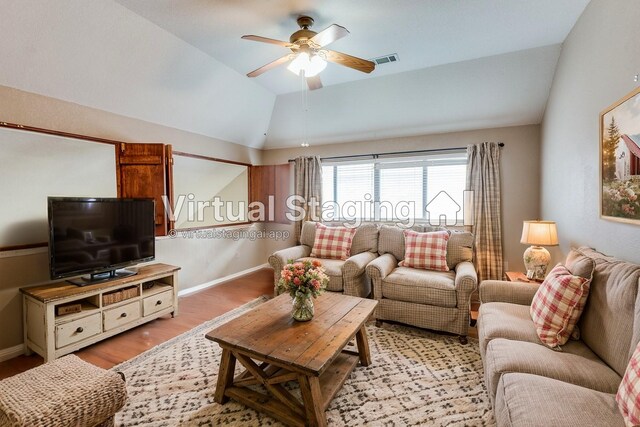 unfurnished room with ceiling fan, dark wood-type flooring, and lofted ceiling